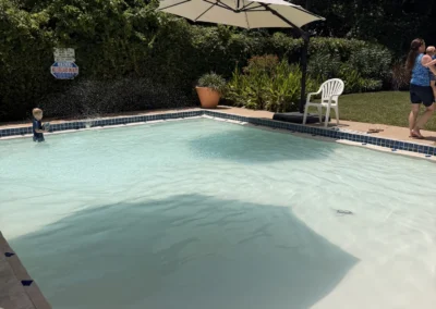 Kiddie pool with shade umbrellas at Heights Pool, San Antonio