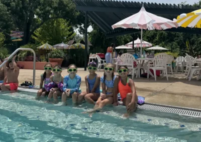 Kids enjoying a summer day at Heights Pool, the Alamo Heights neighborhood swim club