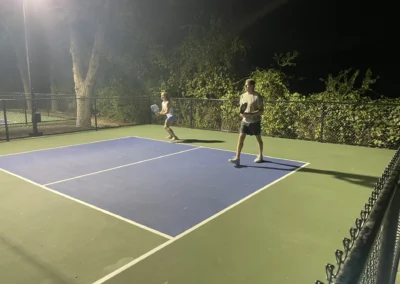 Pickleball under the lights at night, Heights Pool San Antonio
